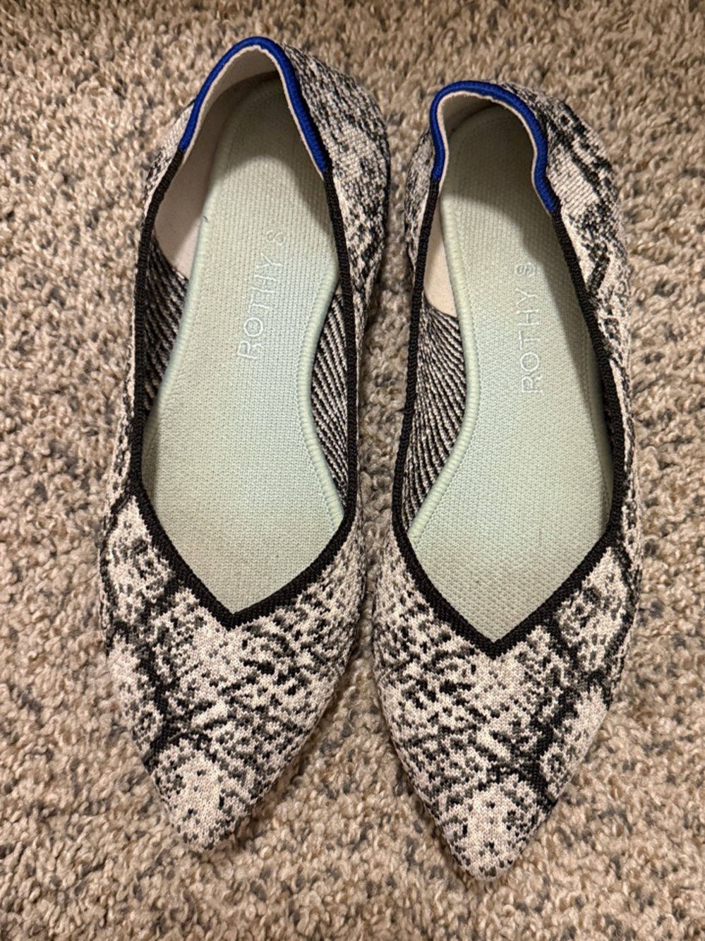 Rothy's Pointed Flats in Black and Cream Snake Print with Blue Trim